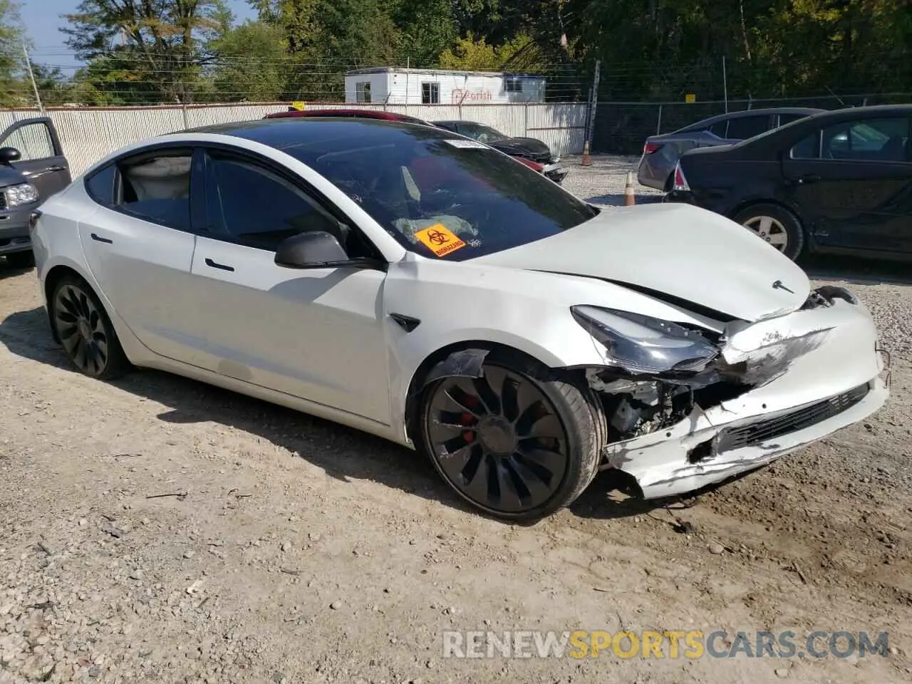 4 Photograph of a damaged car 5YJ3E1EC5NF274049 TESLA MODEL 3 2022