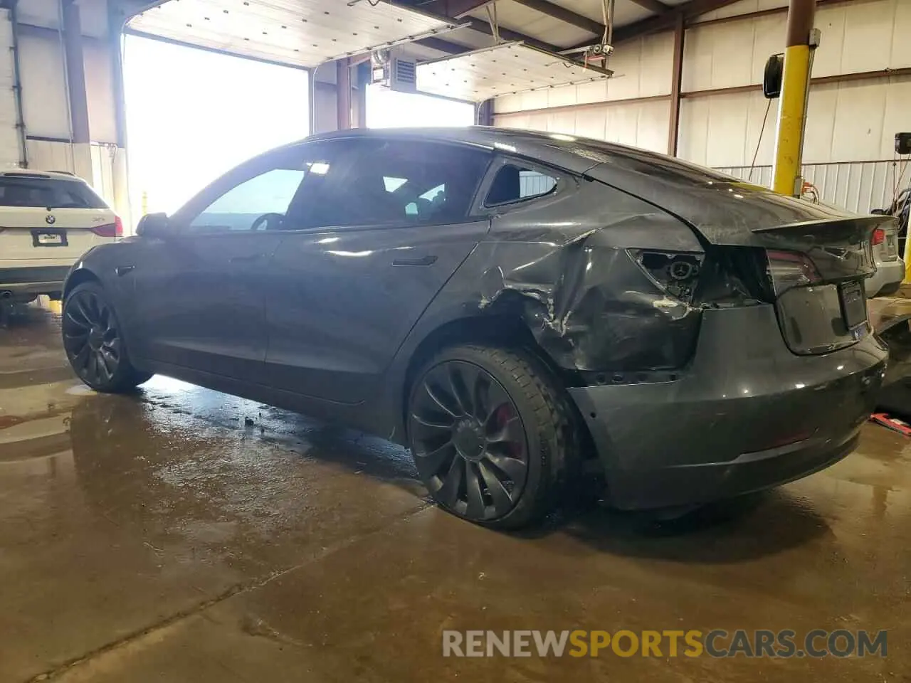 2 Photograph of a damaged car 5YJ3E1EC6NF107912 TESLA MODEL 3 2022