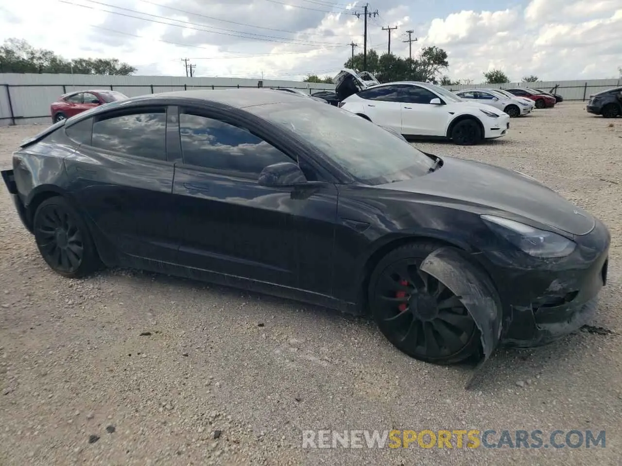 4 Photograph of a damaged car 5YJ3E1EC6NF264758 TESLA MODEL 3 2022
