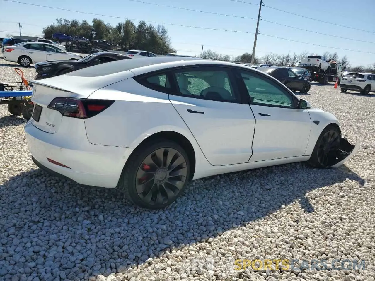 3 Photograph of a damaged car 5YJ3E1EC6NF358784 TESLA MODEL 3 2022