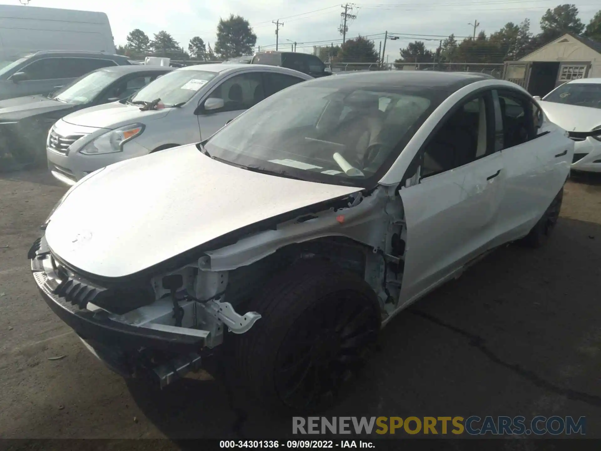 2 Photograph of a damaged car 5YJ3E1EC7NF274408 TESLA MODEL 3 2022