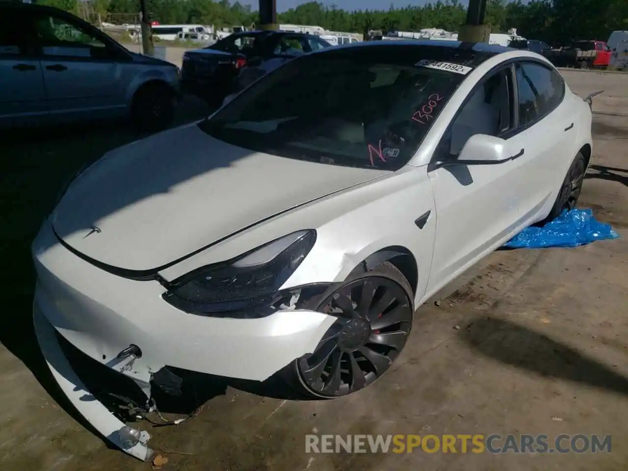 2 Photograph of a damaged car 5YJ3E1EC8NF105420 TESLA MODEL 3 2022