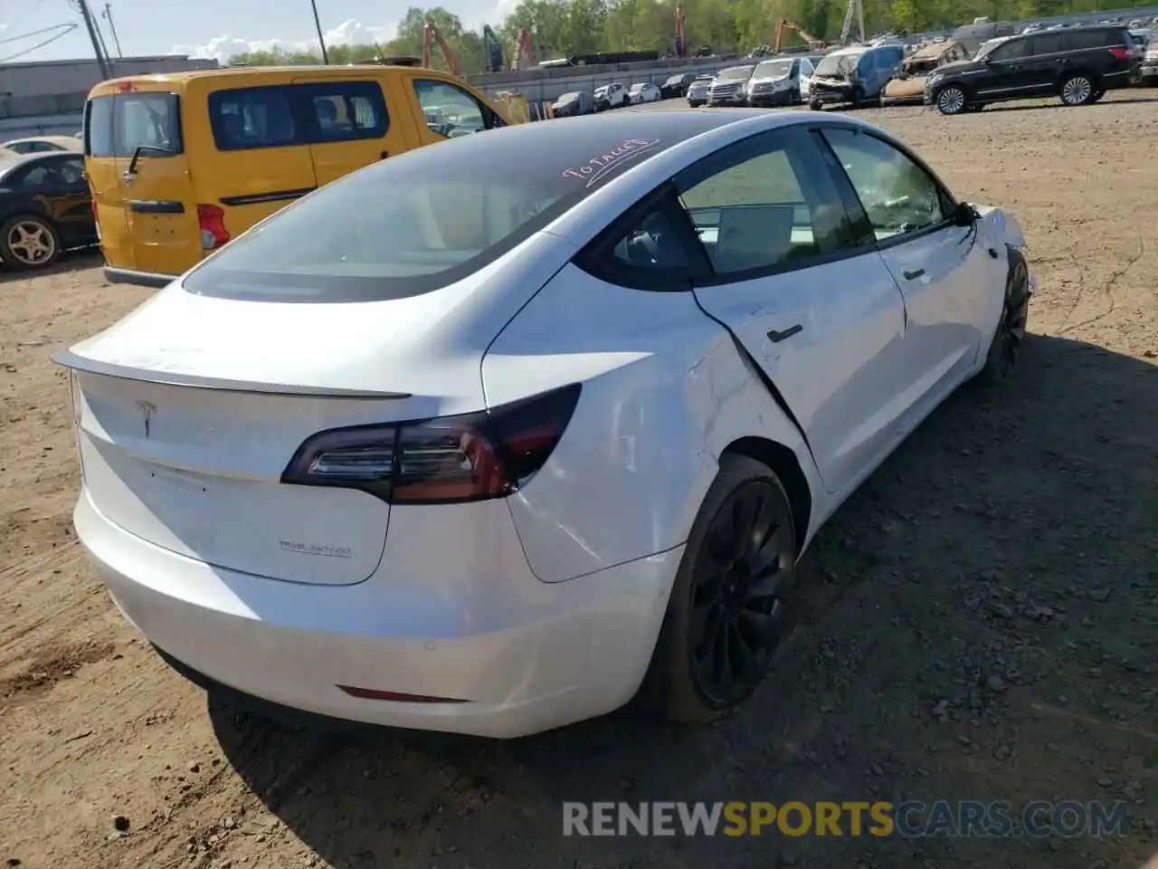 4 Photograph of a damaged car 5YJ3E1EC8NF105708 TESLA MODEL 3 2022