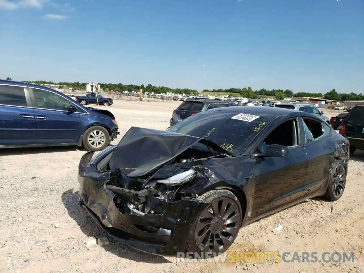 2 Photograph of a damaged car 5YJ3E1EC8NF193529 TESLA MODEL 3 2022