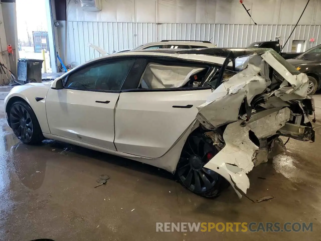 2 Photograph of a damaged car 5YJ3E1EC8NF200530 TESLA MODEL 3 2022