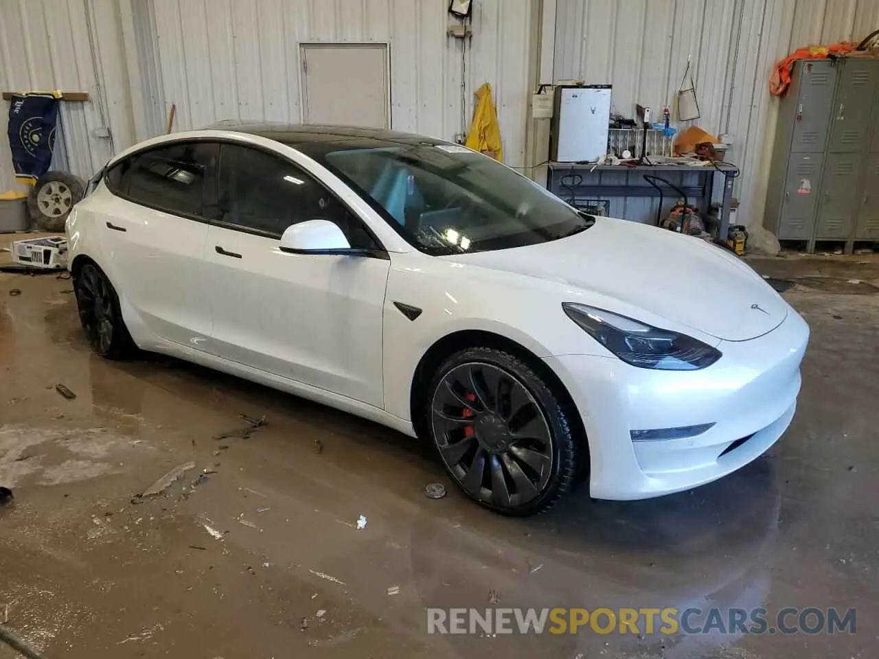 4 Photograph of a damaged car 5YJ3E1EC8NF200530 TESLA MODEL 3 2022