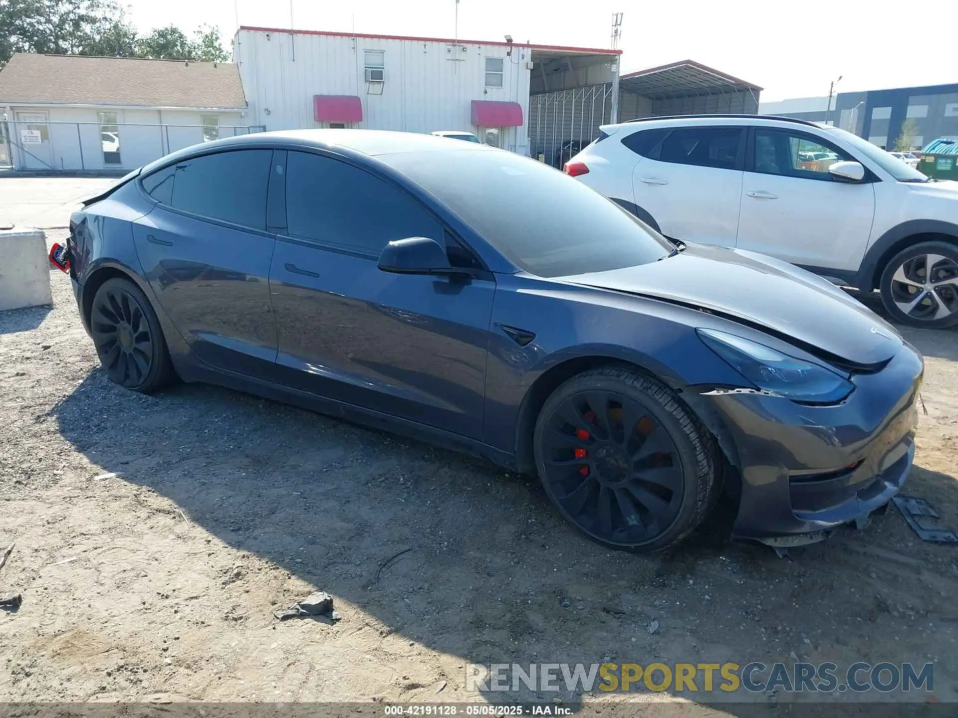 1 Photograph of a damaged car 5YJ3E1EC8NF276975 TESLA MODEL 3 2022