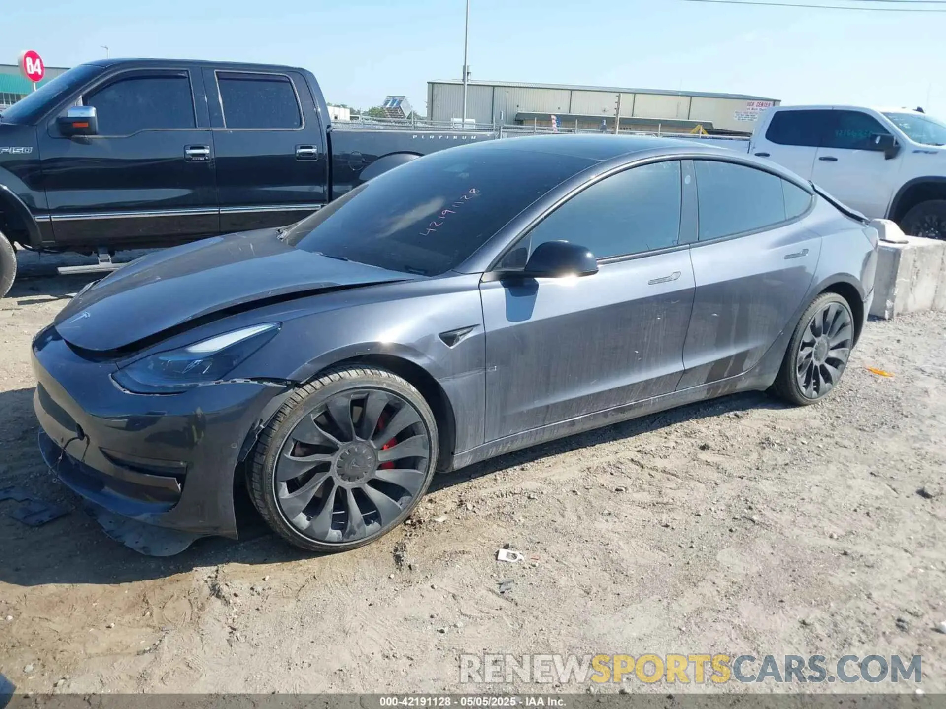 2 Photograph of a damaged car 5YJ3E1EC8NF276975 TESLA MODEL 3 2022