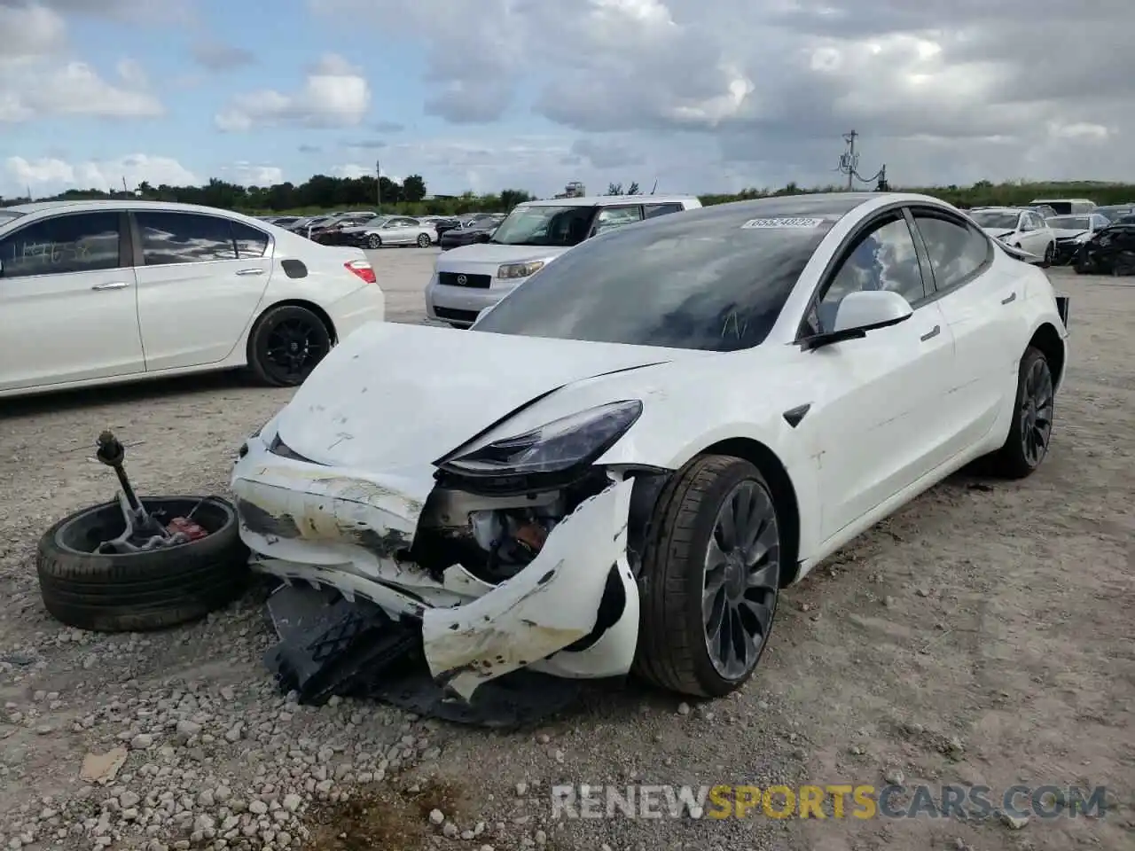 2 Photograph of a damaged car 5YJ3E1EC8NF348810 TESLA MODEL 3 2022