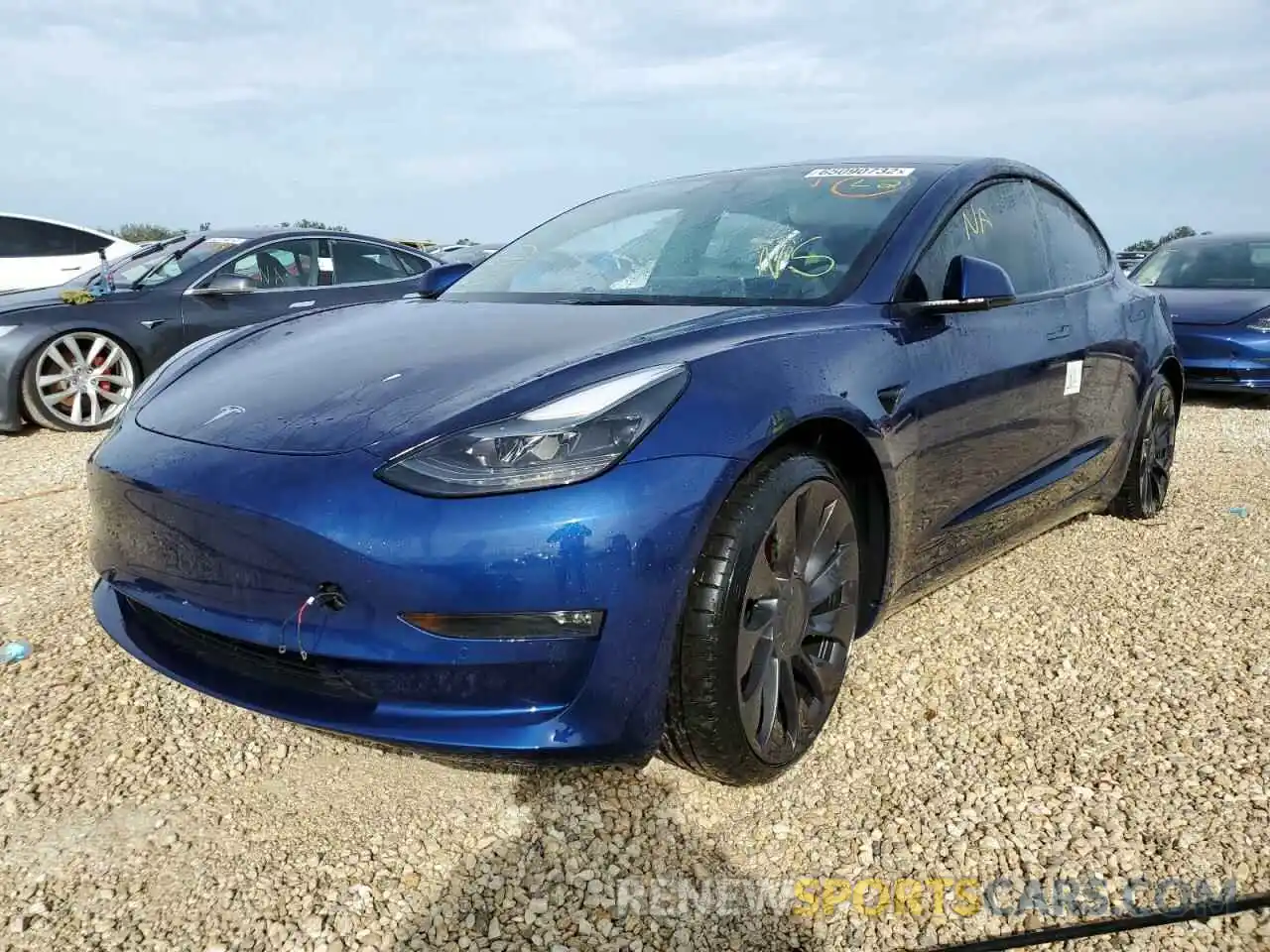 2 Photograph of a damaged car 5YJ3E1EC9NF128236 TESLA MODEL 3 2022