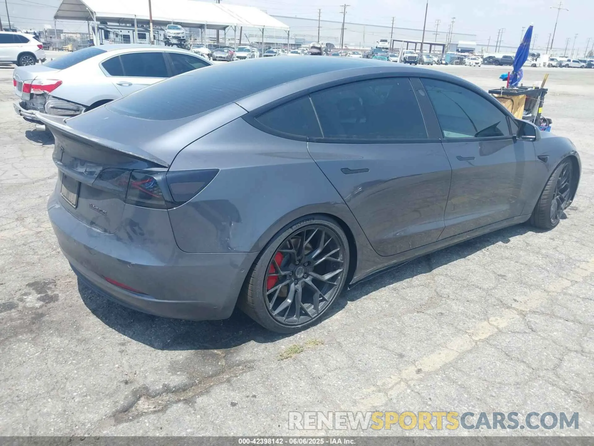 4 Photograph of a damaged car 5YJ3E1EC9NF154920 TESLA MODEL 3 2022