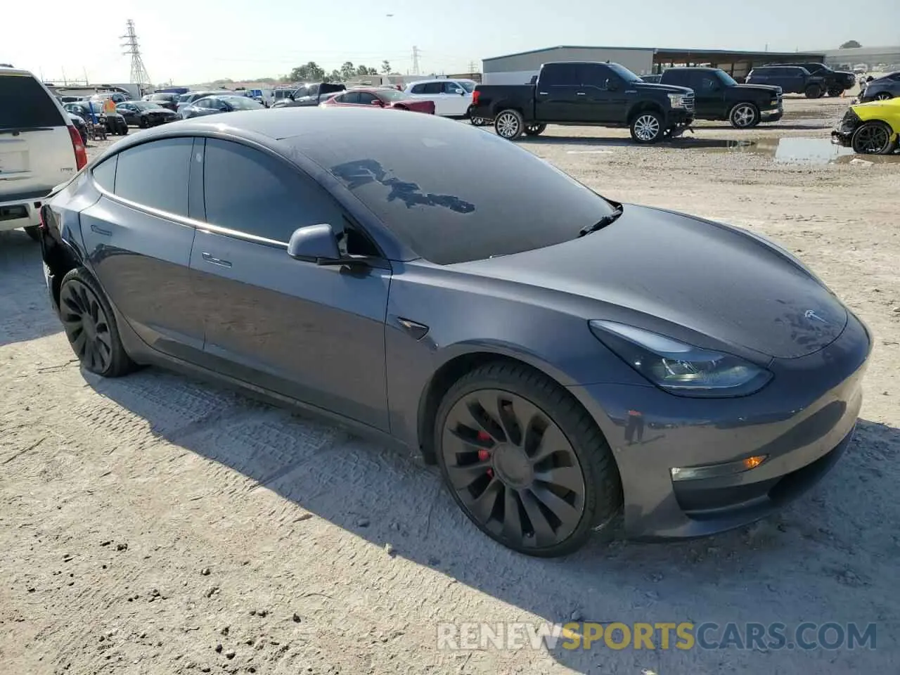 4 Photograph of a damaged car 5YJ3E1EC9NF247839 TESLA MODEL 3 2022