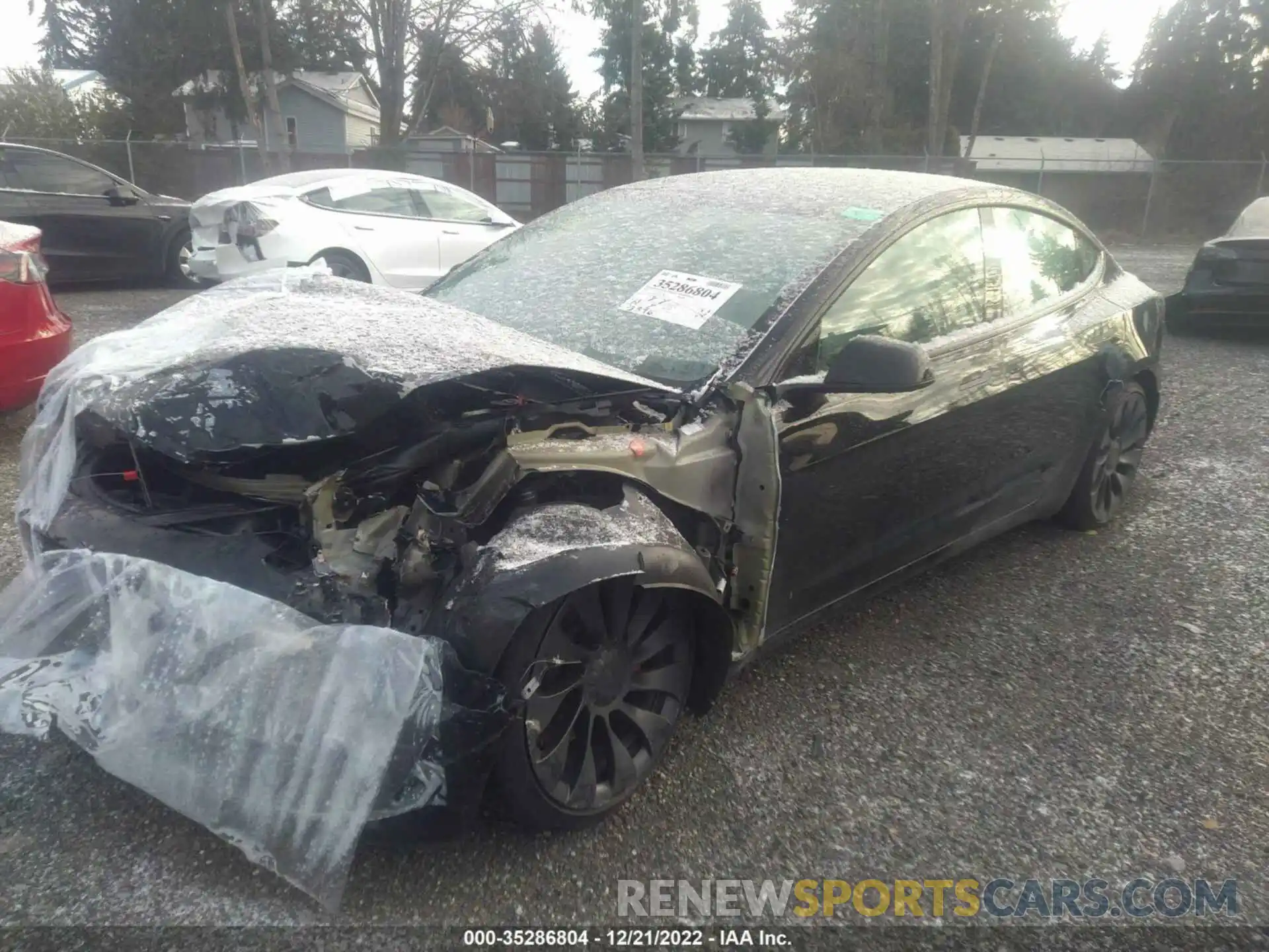 2 Photograph of a damaged car 5YJ3E1EC9NF295423 TESLA MODEL 3 2022