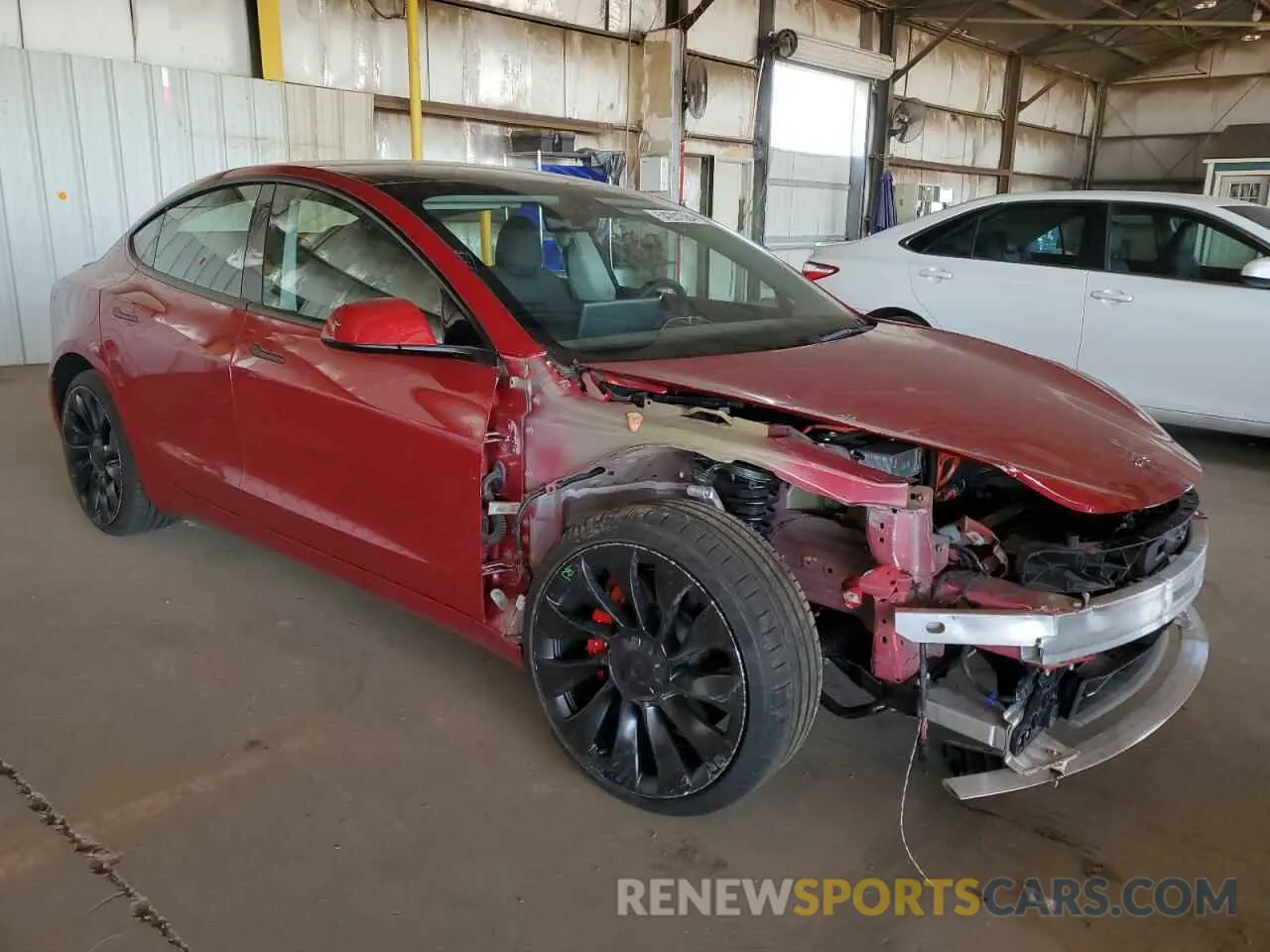 4 Photograph of a damaged car 5YJ3E1EC9NF354874 TESLA MODEL 3 2022