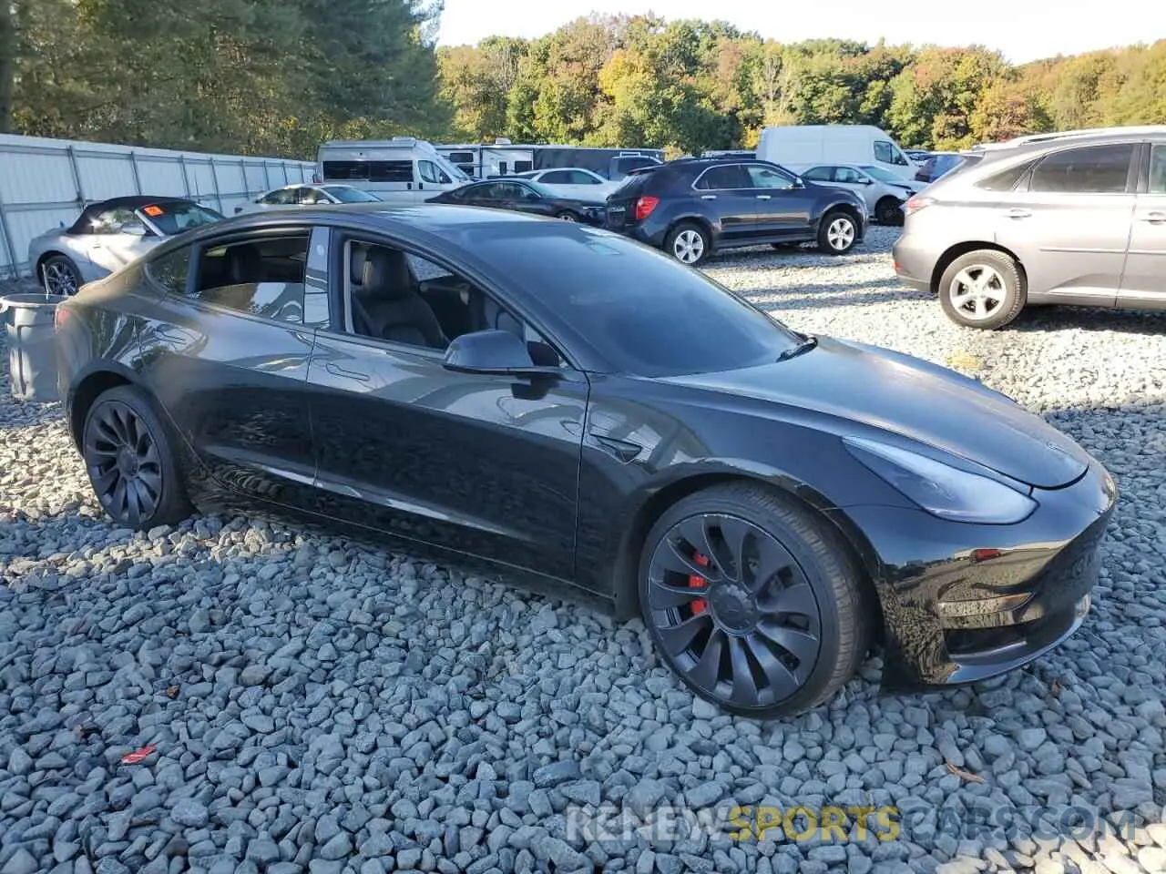 4 Photograph of a damaged car 5YJ3E1ECXNF103264 TESLA MODEL 3 2022