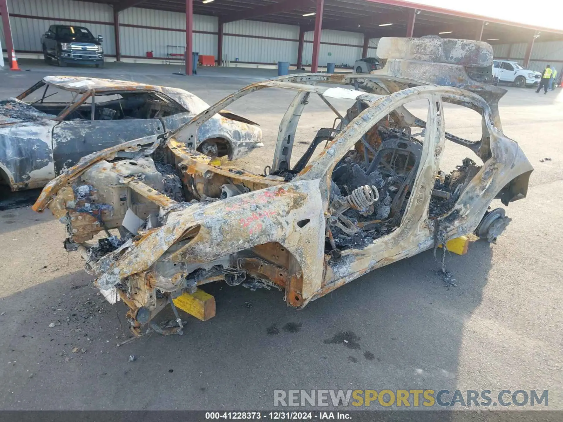 2 Photograph of a damaged car 5YJ3E1ECXNF204692 TESLA MODEL 3 2022