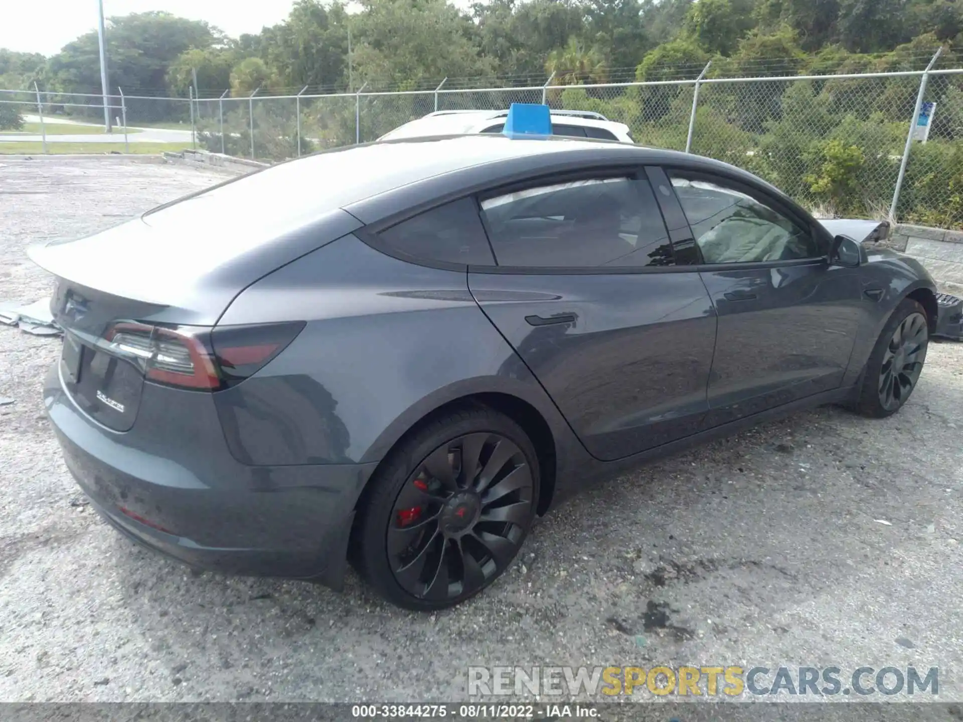 4 Photograph of a damaged car 5YJ3E1ECXNF248224 TESLA MODEL 3 2022