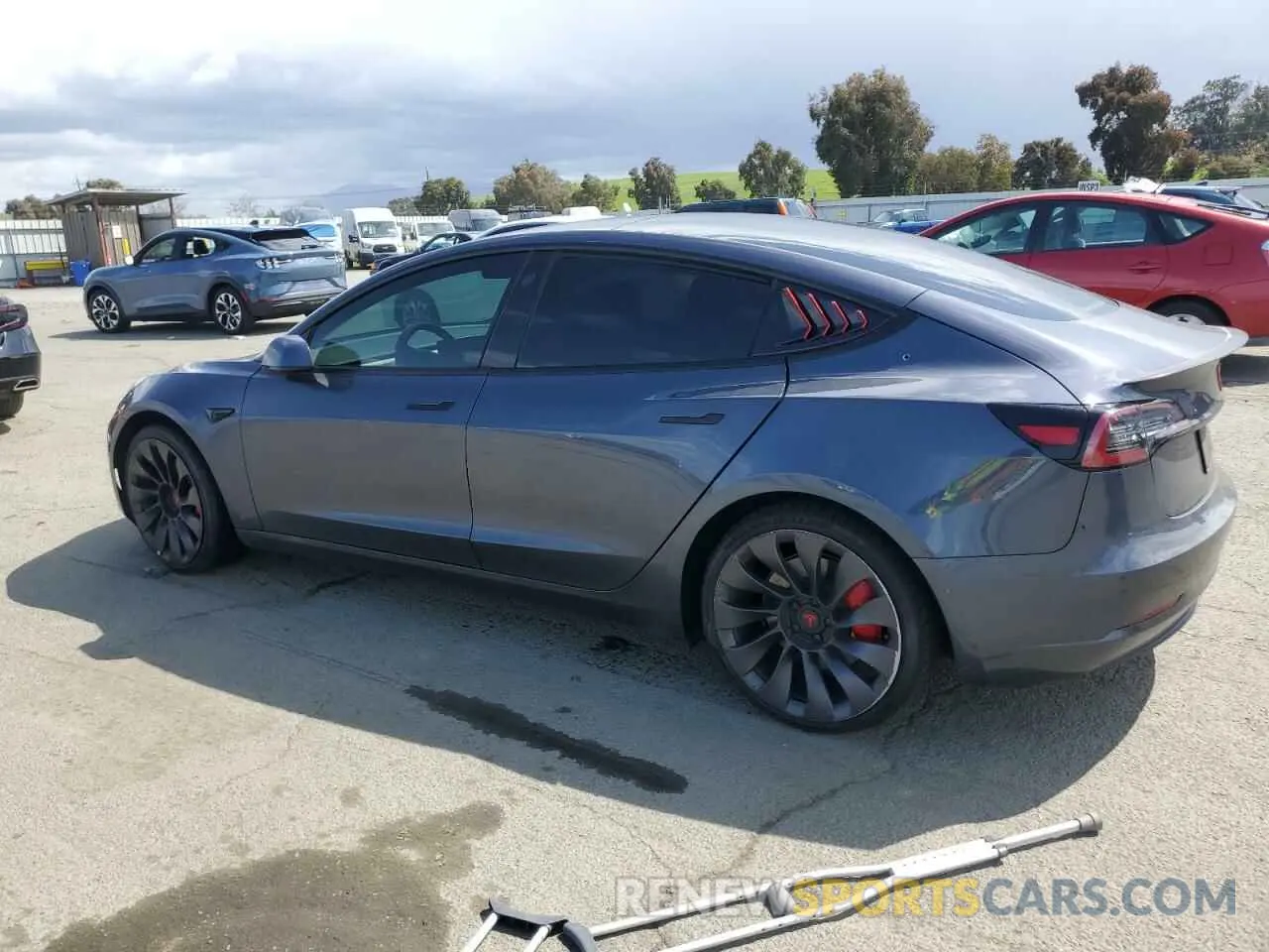 2 Photograph of a damaged car 5YJ3E1ECXNF266805 TESLA MODEL 3 2022