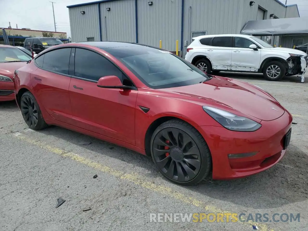 4 Photograph of a damaged car 5YJ3E1ECXNF295947 TESLA MODEL 3 2022