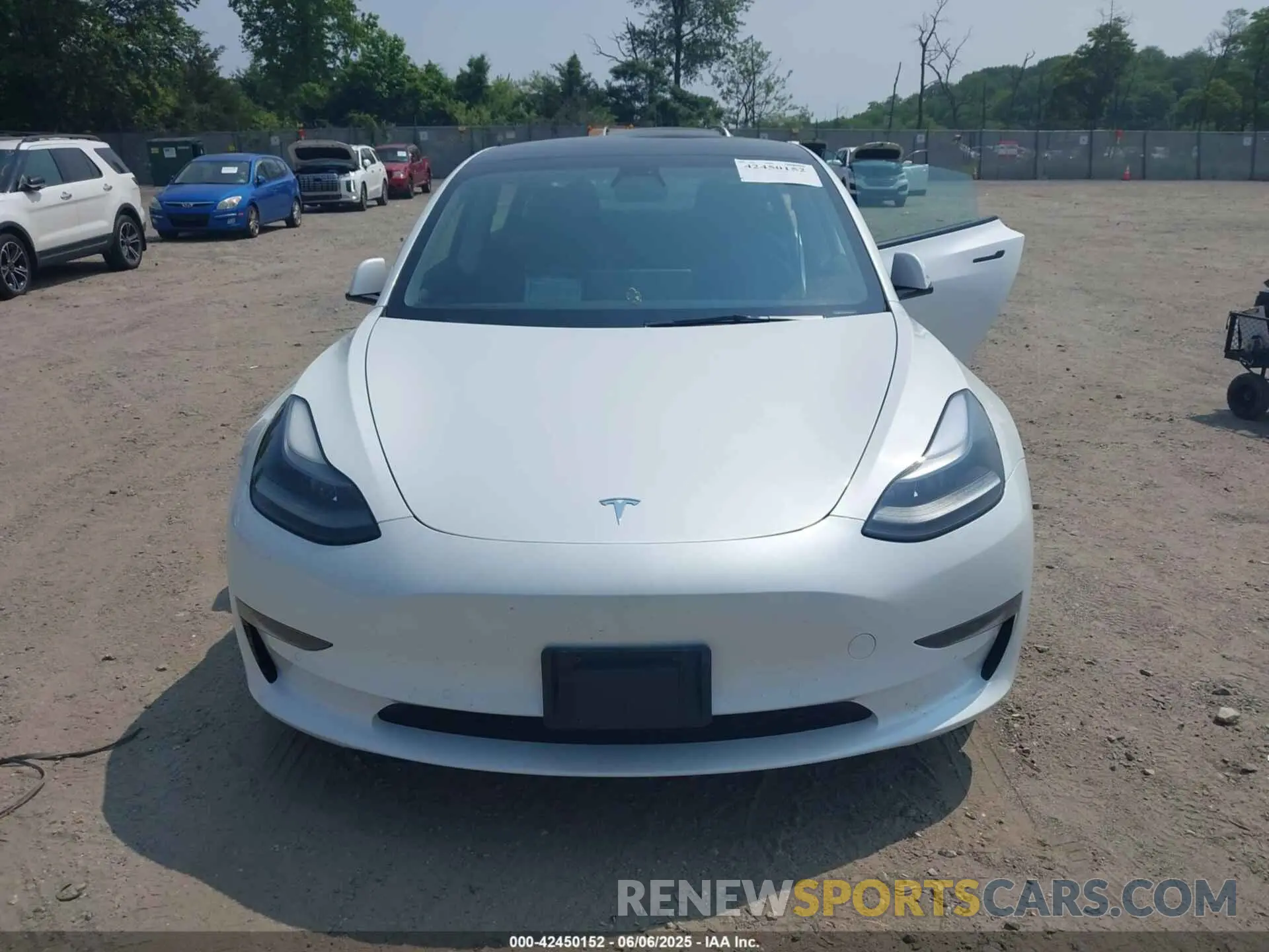 12 Photograph of a damaged car 5YJ3E1ECXNF335833 TESLA MODEL 3 2022