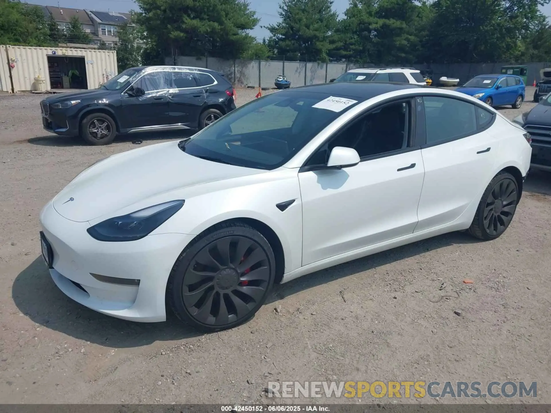 2 Photograph of a damaged car 5YJ3E1ECXNF335833 TESLA MODEL 3 2022