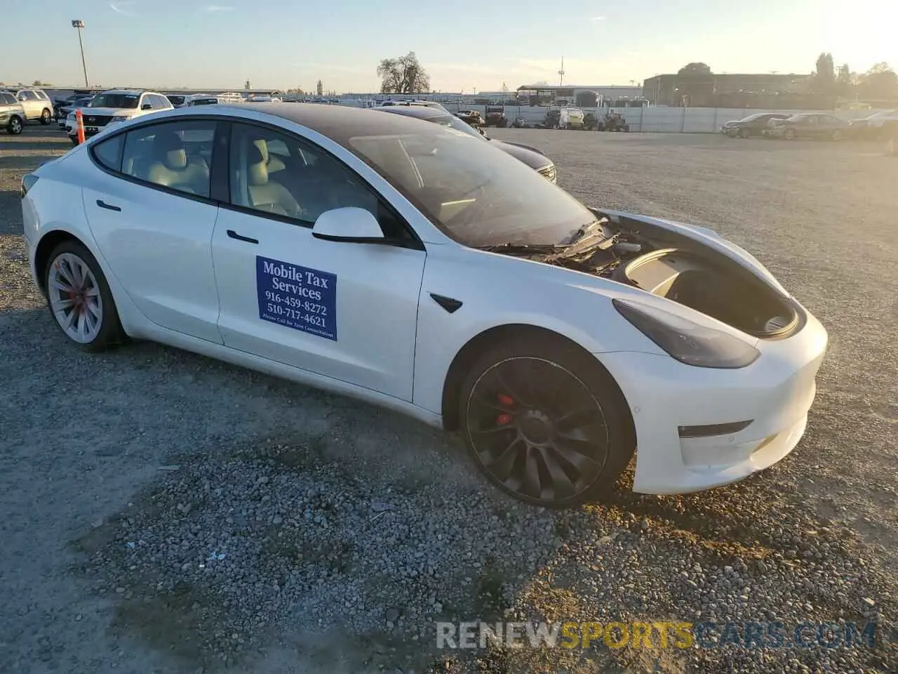 4 Photograph of a damaged car 5YJ3E1ECXNF354477 TESLA MODEL 3 2022