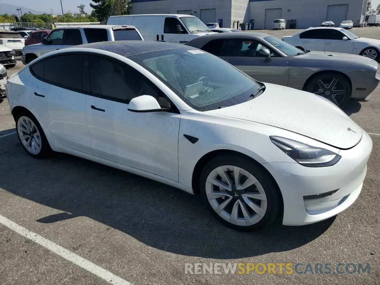 4 Photograph of a damaged car 5YJ3E1EA0PF383018 TESLA MODEL 3 2023