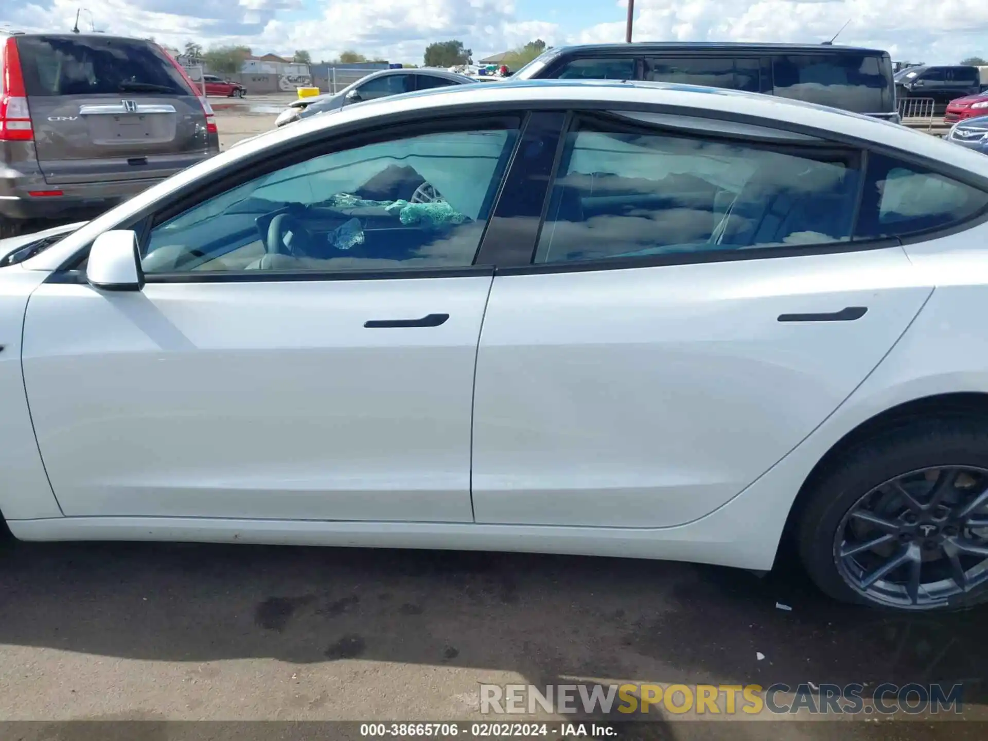 14 Photograph of a damaged car 5YJ3E1EA0PF405566 TESLA MODEL 3 2023