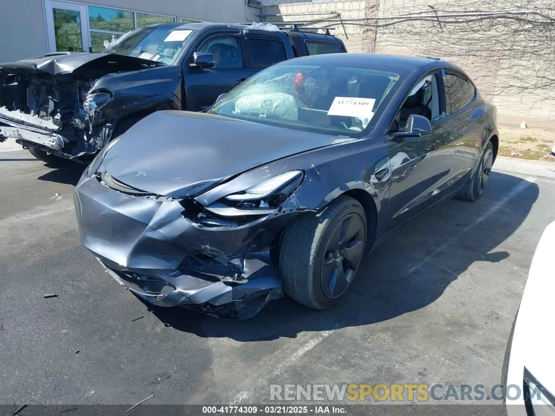 2 Photograph of a damaged car 5YJ3E1EA0PF408774 TESLA MODEL 3 2023