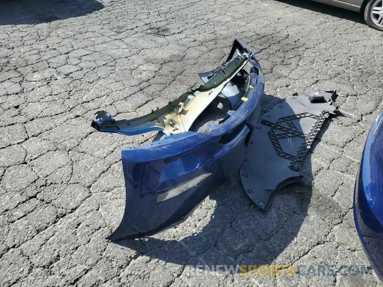 12 Photograph of a damaged car 5YJ3E1EA0PF418933 TESLA MODEL 3 2023