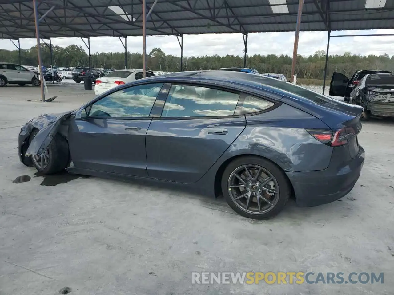 2 Photograph of a damaged car 5YJ3E1EA0PF435649 TESLA MODEL 3 2023