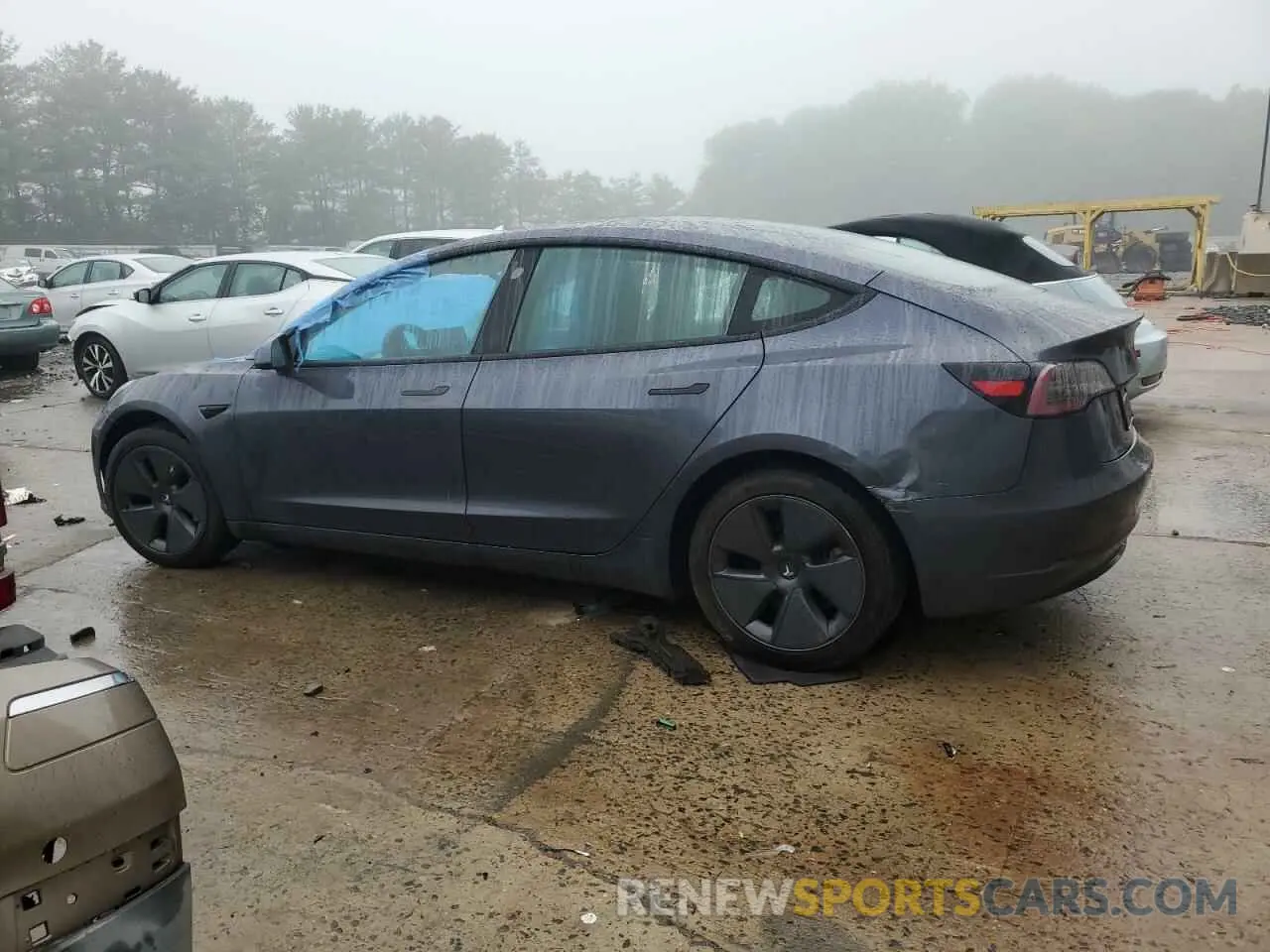2 Photograph of a damaged car 5YJ3E1EA0PF436087 TESLA MODEL 3 2023