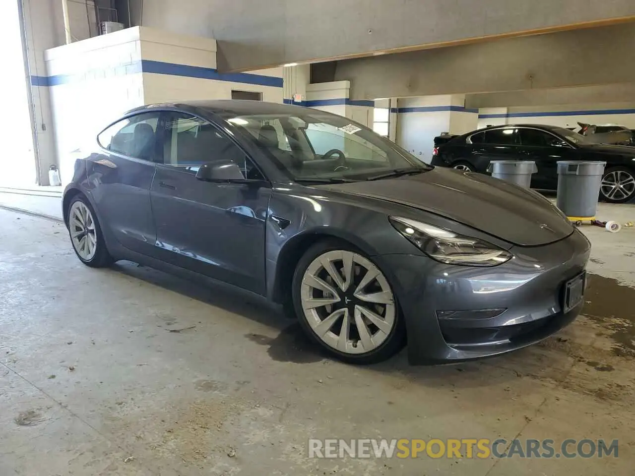 4 Photograph of a damaged car 5YJ3E1EA0PF446845 TESLA MODEL 3 2023