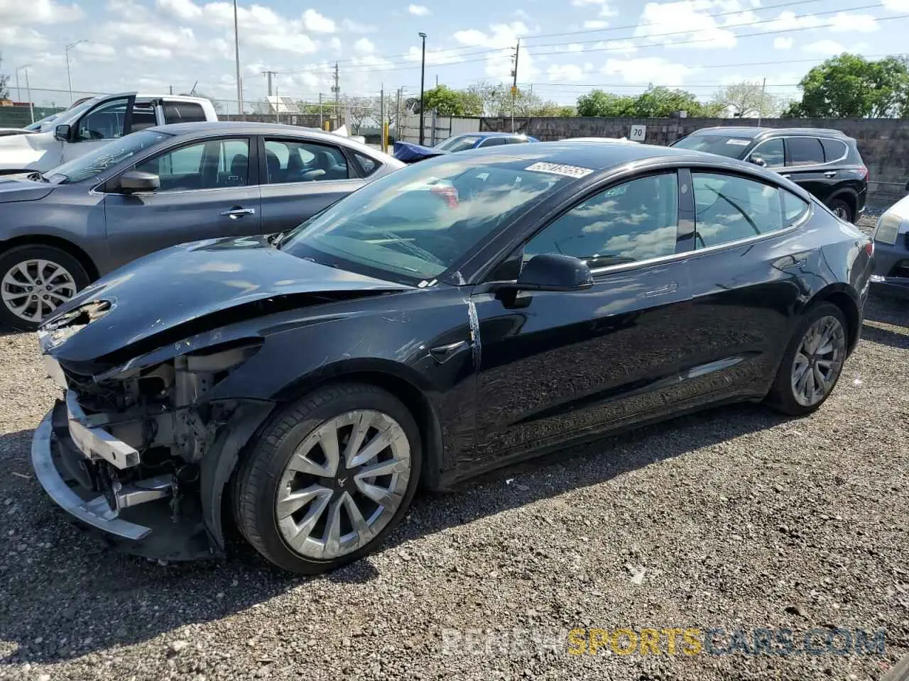 1 Photograph of a damaged car 5YJ3E1EA0PF449163 TESLA MODEL 3 2023