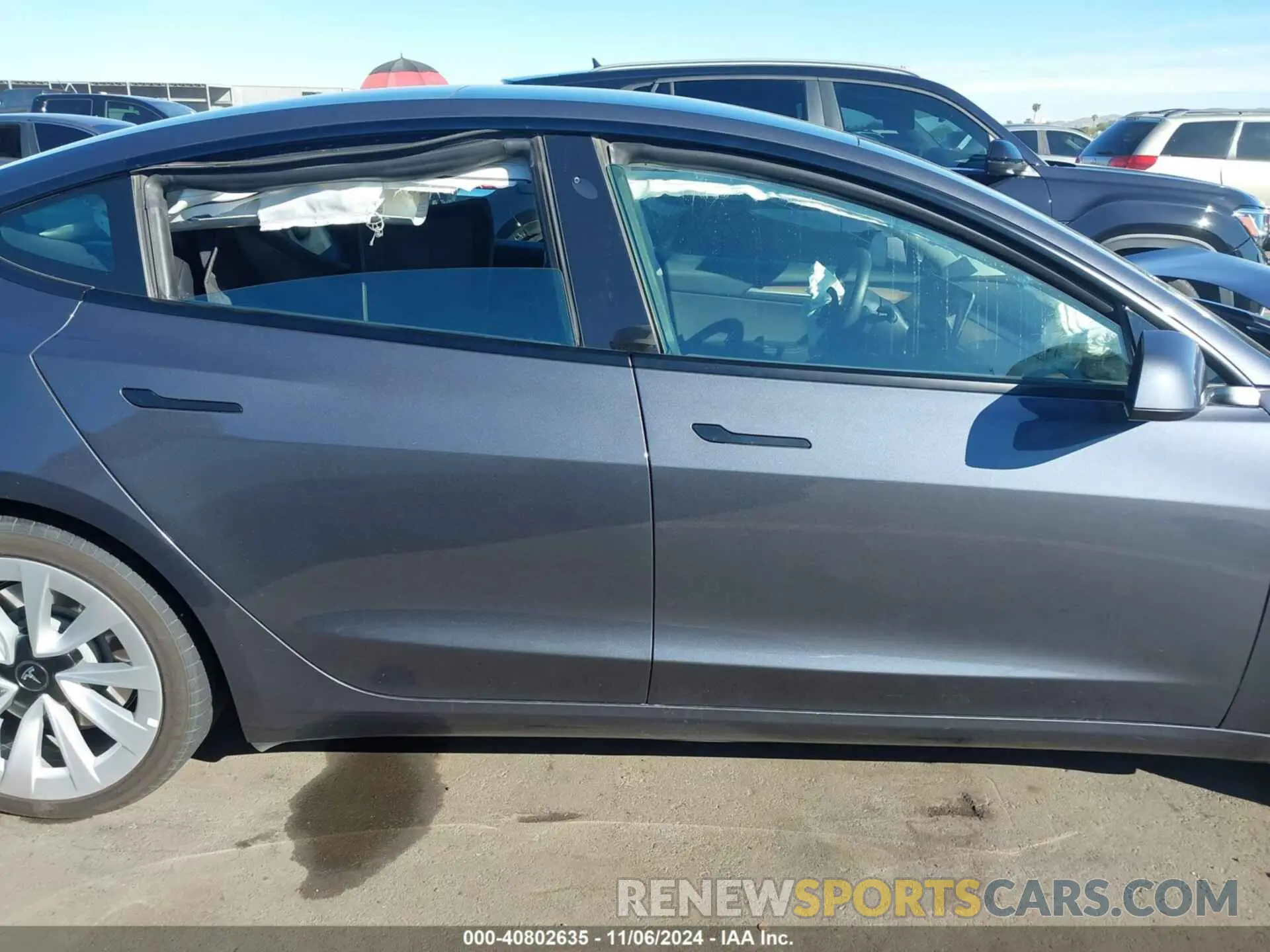 12 Photograph of a damaged car 5YJ3E1EA0PF454573 TESLA MODEL 3 2023