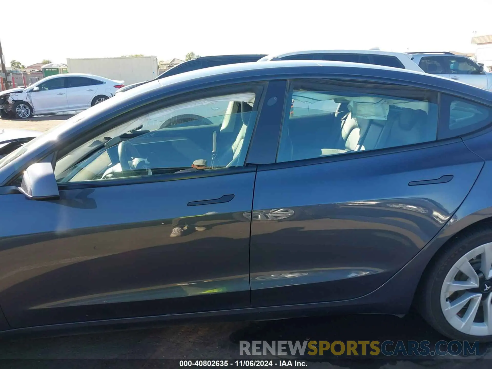 13 Photograph of a damaged car 5YJ3E1EA0PF454573 TESLA MODEL 3 2023