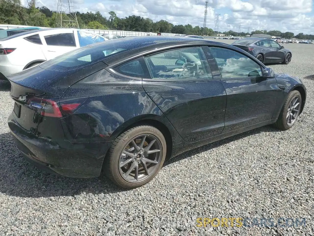 3 Photograph of a damaged car 5YJ3E1EA0PF455481 TESLA MODEL 3 2023