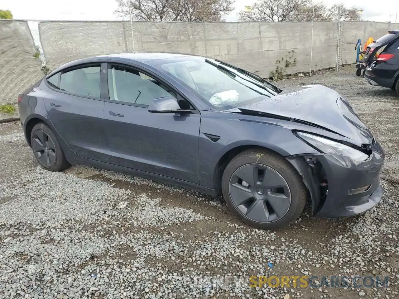 4 Photograph of a damaged car 5YJ3E1EA0PF458851 TESLA MODEL 3 2023