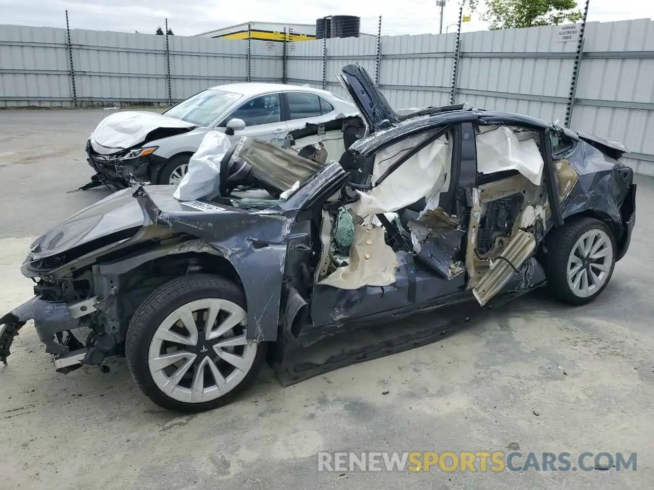 1 Photograph of a damaged car 5YJ3E1EA0PF460230 TESLA MODEL 3 2023