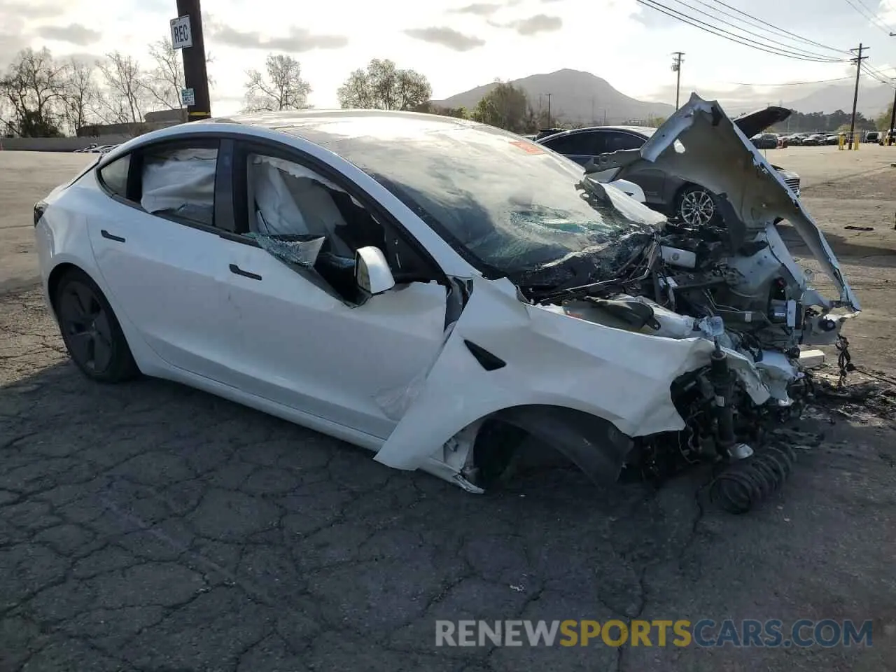 4 Photograph of a damaged car 5YJ3E1EA0PF466982 TESLA MODEL 3 2023