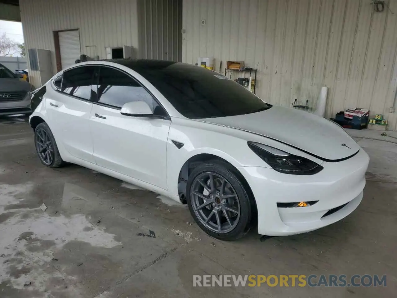 4 Photograph of a damaged car 5YJ3E1EA0PF468571 TESLA MODEL 3 2023