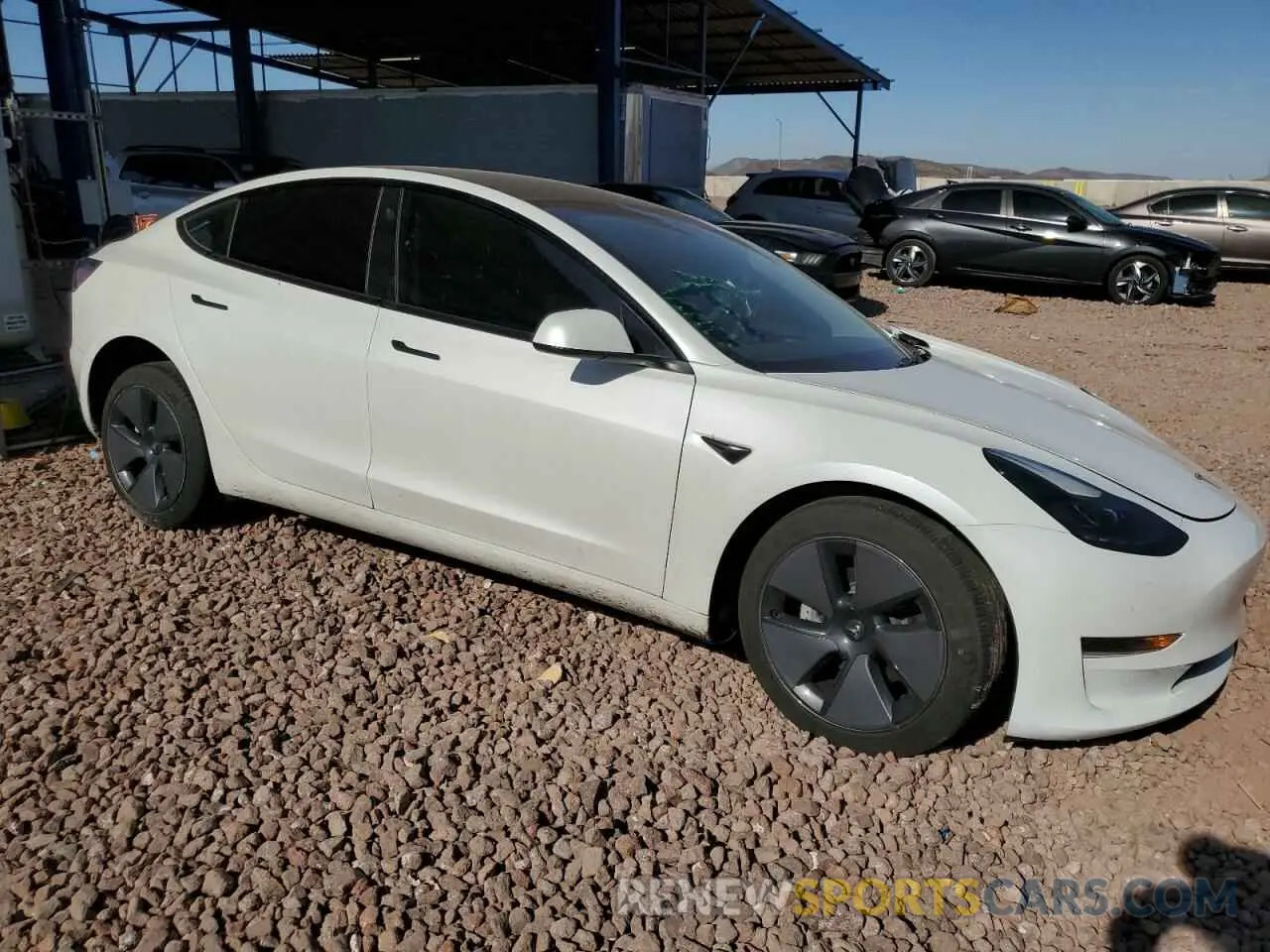 4 Photograph of a damaged car 5YJ3E1EA0PF475715 TESLA MODEL 3 2023