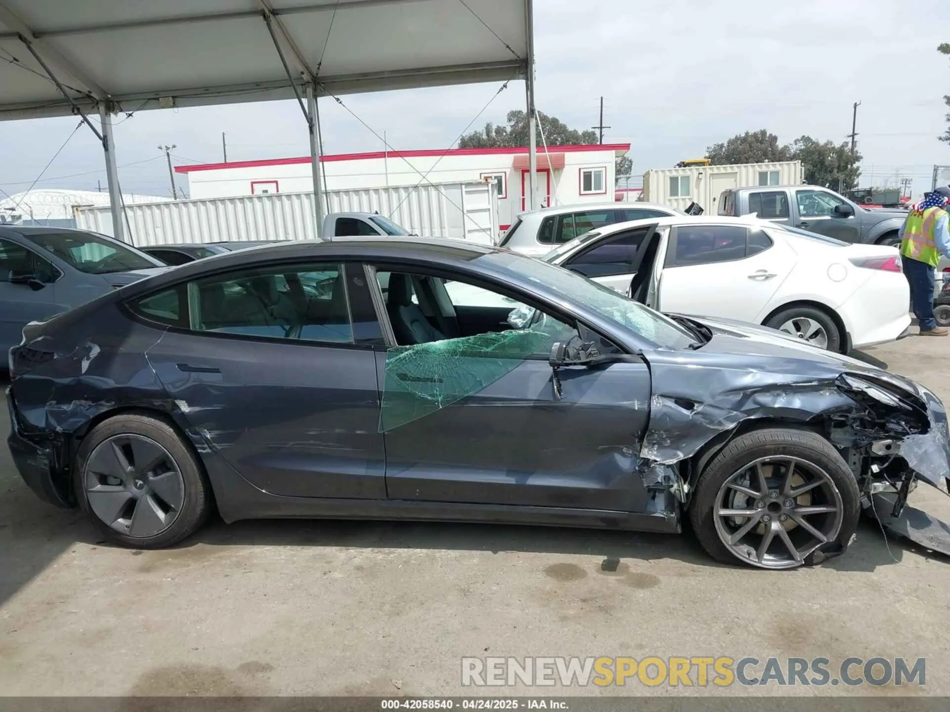 12 Photograph of a damaged car 5YJ3E1EA0PF518904 TESLA MODEL 3 2023