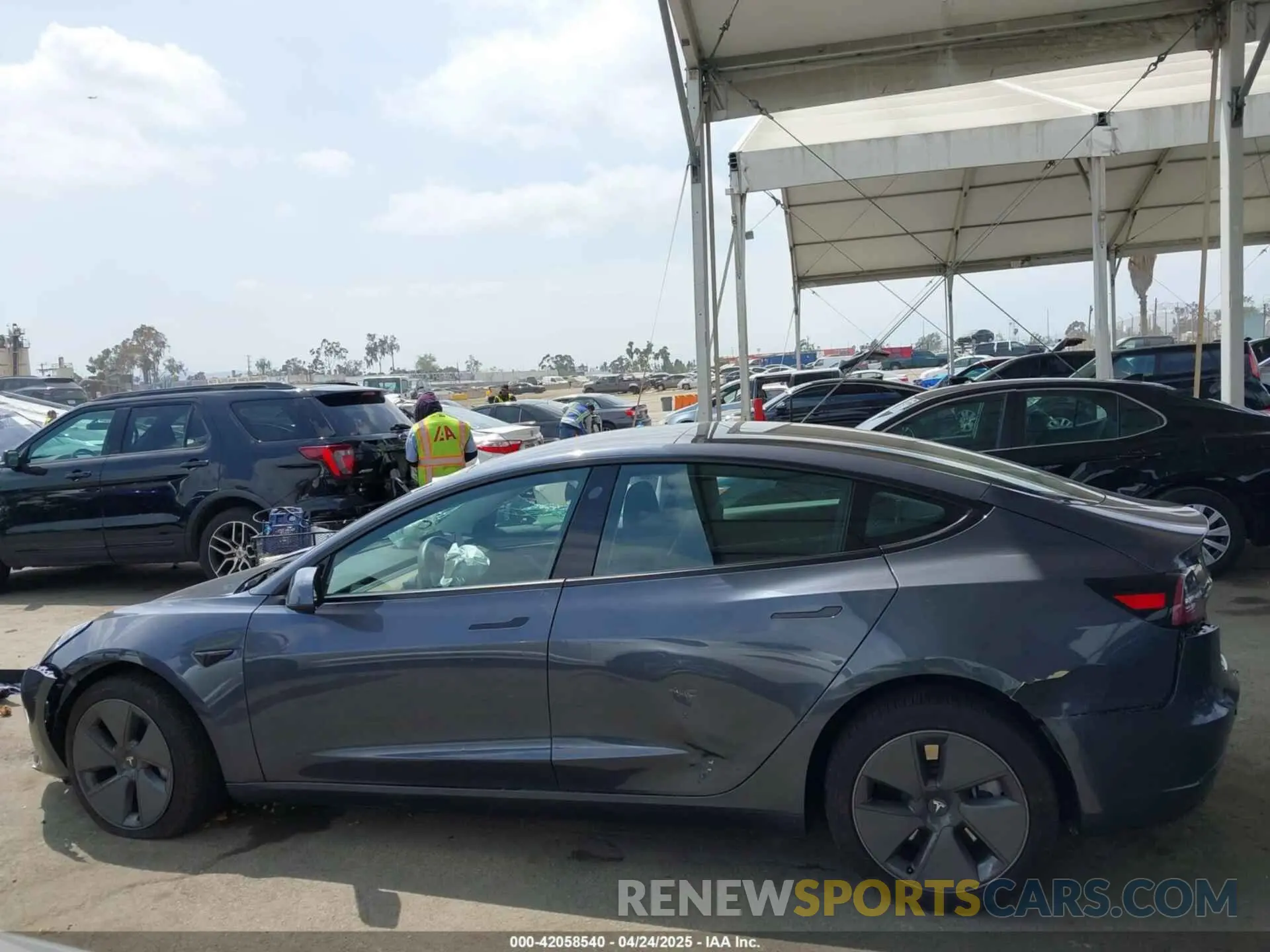 13 Photograph of a damaged car 5YJ3E1EA0PF518904 TESLA MODEL 3 2023