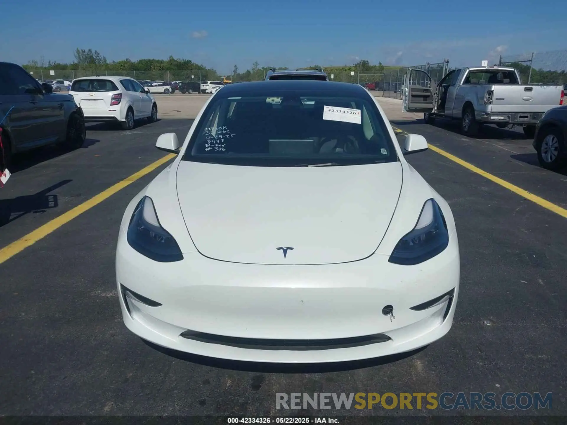 12 Photograph of a damaged car 5YJ3E1EA0PF548498 TESLA MODEL 3 2023