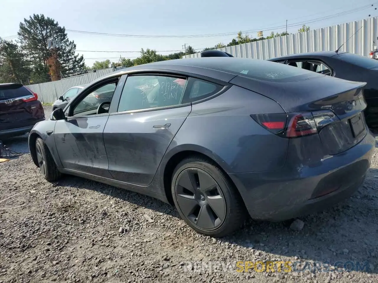 2 Photograph of a damaged car 5YJ3E1EA0PF556620 TESLA MODEL 3 2023