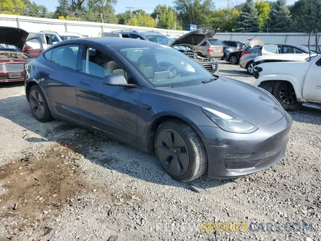 4 Photograph of a damaged car 5YJ3E1EA0PF556620 TESLA MODEL 3 2023