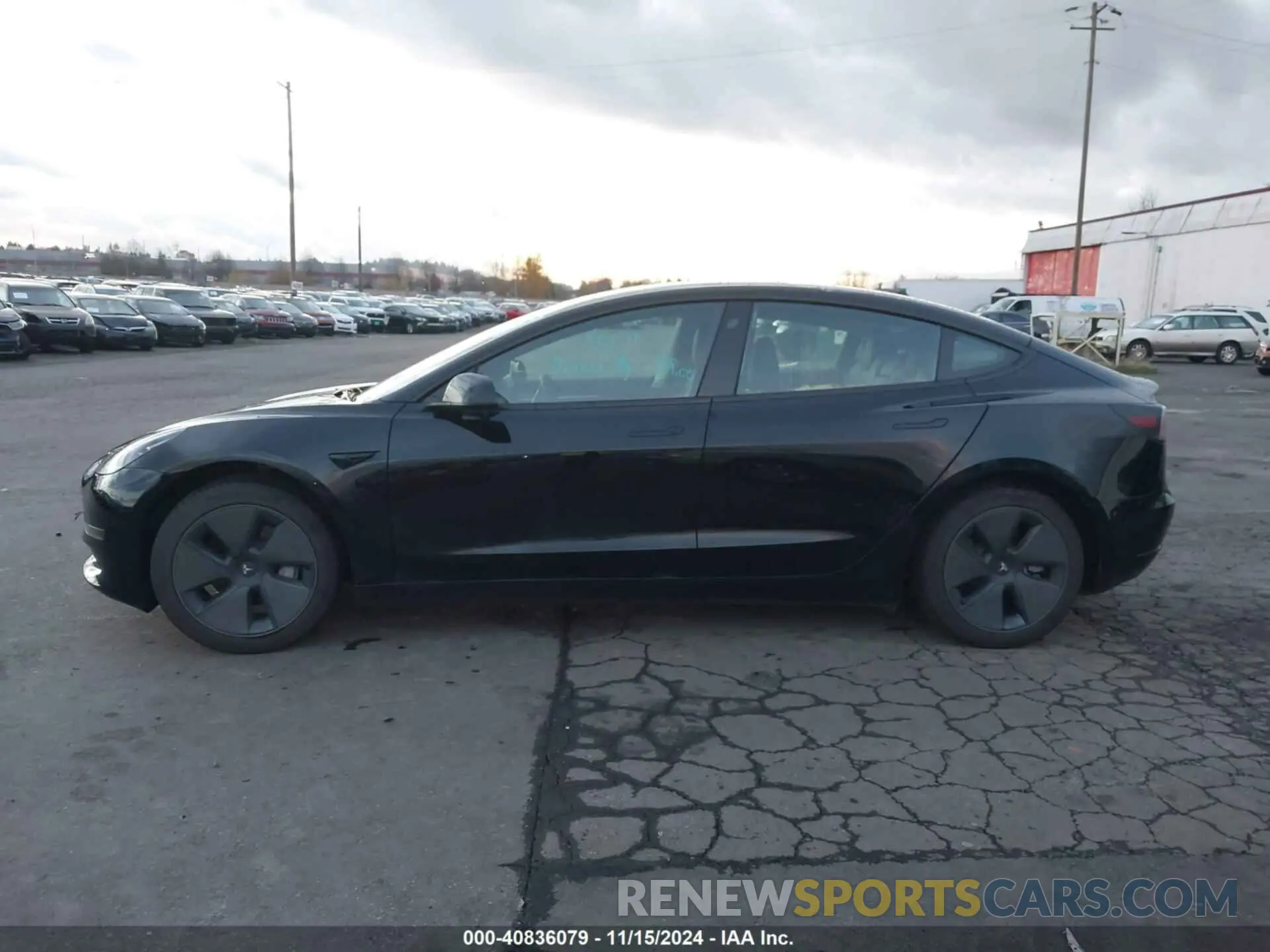 13 Photograph of a damaged car 5YJ3E1EA0PF560814 TESLA MODEL 3 2023