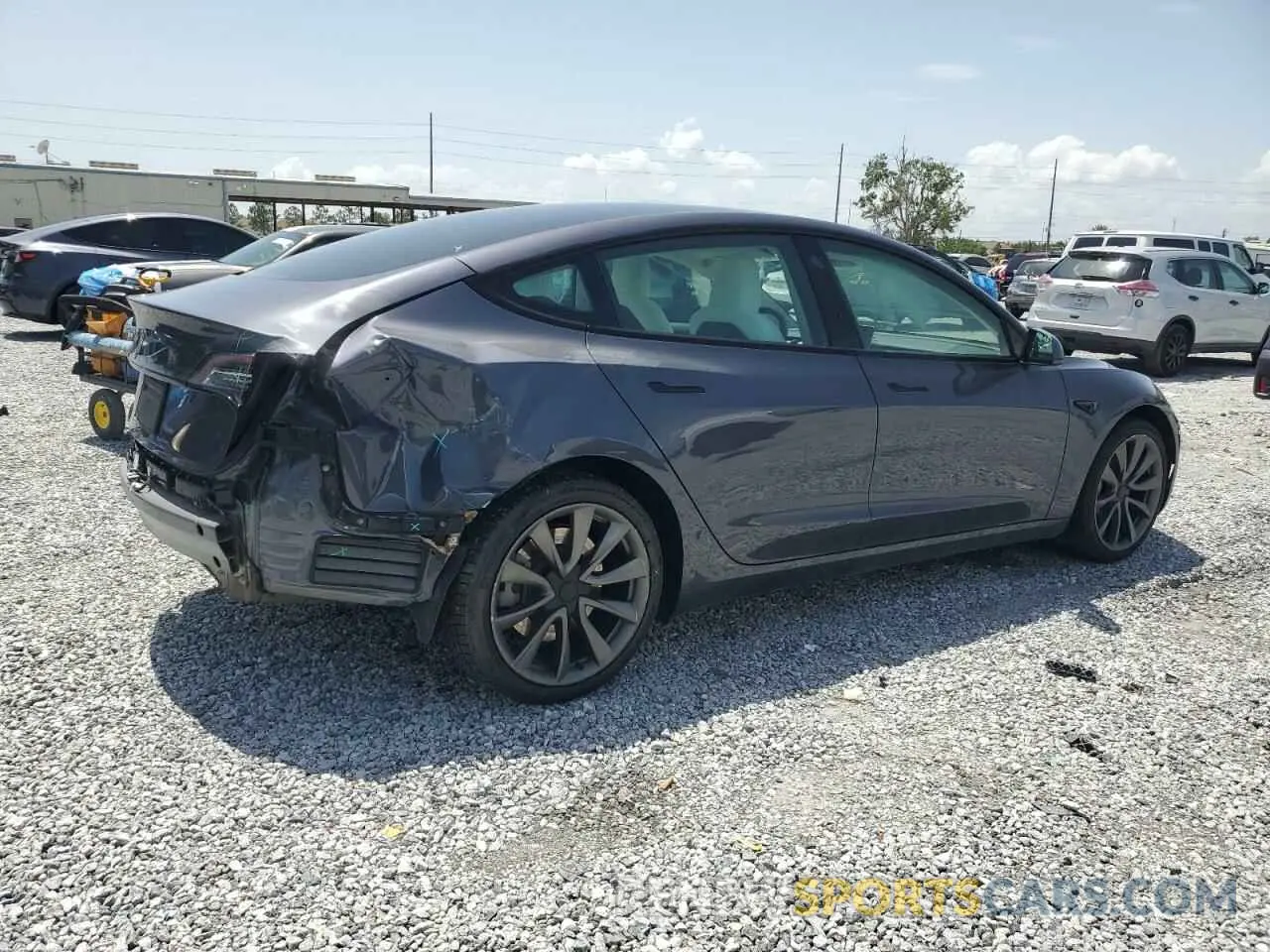 3 Photograph of a damaged car 5YJ3E1EA0PF571943 TESLA MODEL 3 2023