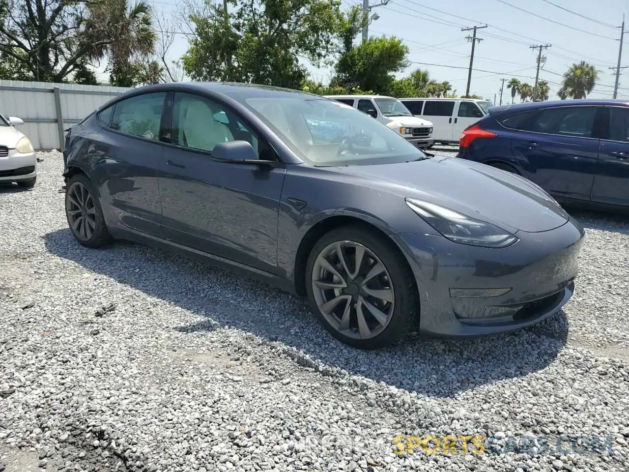 4 Photograph of a damaged car 5YJ3E1EA0PF571943 TESLA MODEL 3 2023